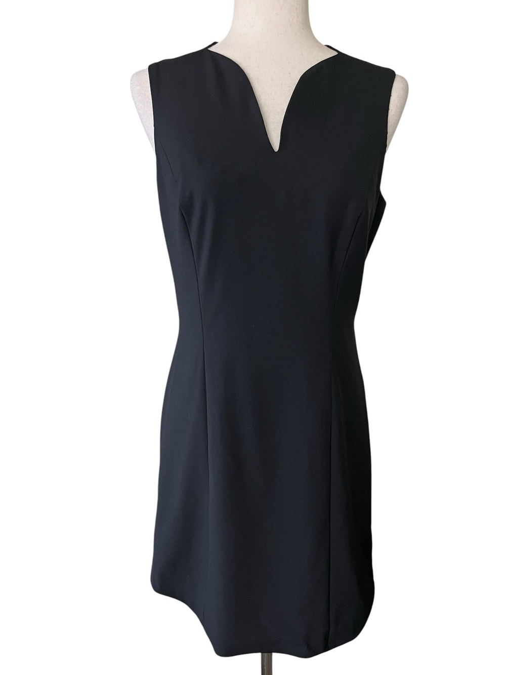 Theyskens’ Theory wool sheath dress featuring a distinctive notched neckline